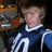 Pixelated image of a person in a dark blue and white sports jersey with a large white number 10, standing next to another figure, with green background text reading 'u no u are girlfriend jealous of my.......aley<333'