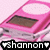 Pixelated pink car with brown interior and white roof section, black banner below displaying 'shannon' in blocky text flanked by heart symbols.