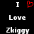 Black background with white text and red heart symbol arranged in two , each containing 'I', 'Love', and 'Zhiggy' stacked vertically