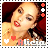 Alicia Keys appears in a of six stamps with red backgrounds, wearing a gold necklace and red lipstick, with heart symbols and the name 'Alicia' below her face