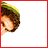Animated sequence showing a character in green elf attire with brown hair and a pointed hat, transitioning from partial to full view while holding a white object.