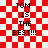 Red and white checkered background with pixelated text reading "TOM IS THE BEST!!!" in four identical arrangements, two of which have faint red overlay effects.