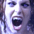 Pixelated image of a person with mouth open in scream, next to "VAN HELSING" text on dark background.