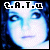 Four- of a person's face with blue-toned pixelated images, each showing a different facial expression and angle, with 't.A.T.u' text above each