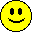 Yellow pixelated smiley faces with black eyes and mouths, some showing red tongues or small dots on lips.
