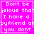 Four identical pink with white pixelated text reading 'Don't be jealous that I have a boyfriend and you don't' arranged in a , one shows cursor interaction