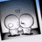 Two pixelated figures in white and gray stand side-by-side against a gradient background, with the word "suprise!" in white pixelated text on a black background to the right.