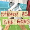 A static image shows a person in white clothing holding a tennis racket on a tennis court with overlaid text reading "Steady as she goes.".