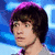 Two side-by-side pixelated portraits of young men with distinct backgrounds and text at the bottom.