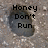 Pixelated image with two dark circular shapes on a textured background, each containing black text.