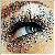Pixelated static image of a stylized figure with dark hair and light skin tones against a multicolored pixel grid background.
