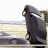 A 4-frame animated contact sheet showing a car stunt sequence with