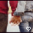 Animated contact sheet showing a person's lower body in red pants and gray jacket holding hands with another figure, featuring pixelated heart icons that change size across frames.