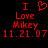 Red pixelated text and heart symbol on black background, displaying "I ❤️ Love Mikey 11.21.07" in two identical vertical