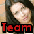A pixelated image of a person with long dark hair and a light background, with red text reading "Team Carla" at the bottom.