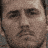 A pixelated image shows a man's face transitioning from clear to heavily distorted, with yellow chevron arrows and text reading 'COLT' and 'DEATH RACE' on black backgrounds.