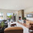 Pixelated static image of an interior space with furniture and blurred background elements.