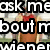 A pixelated image shows a person in an orange outfit with red accents standing outdoors, overlaid with large black-and-white text reading "ask me about my wiener."