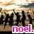 Silhouettes of people jumping on a beach at sunset with pink text reading 'noel.'