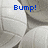 A white volleyball with blue text labels 'Bump!', 'Set!', and 'Spike!' appearing in different positions across four