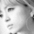A black-and-white animated contact sheet showing two frames of a stylized character with short hair and closed eyes on the left, paired with large Japanese kanji and partial text "Ayumi" on the right.