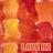 repeating orange and yellow pixelated icons with 'LOVE ME' text in white, each icon showing a stylized figure against a textured background