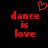 Red pixelated text 'dance is love' with a red heart symbol above, displayed on a black background.