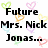 Pixelated text reads 'Future Mrs. Nick Jonas... well in the afternoon till 7pm cause then hes laura's' over colorful heart shapes on white background.