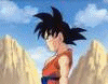 Dragon Ball Z characters in various poses against a mountainous backdrop with blue sky and clouds.