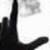 Black-and-white hand gestures form the letters L, O, V, E with a red heart and stylized text on black background.