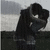 Two static frames of a pixelated image showing a dark figure in a pose with text on the right side.