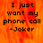 A pixelated text-based image with orange and red flame-like background, displaying 'I just want my phone call -Joker' in black block letters.