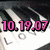 Pixelated image showing pink numerals '10.19.07' over a blurred background with dark and light tones.