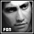 Black-and-white pixelated portrait of a person with dark hair, featuring visible text 'FAN' in the bottom-left corner.