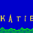 Blue background with green grassy terrain and yellow text repeating 'KATIEK' in pixelated font, partially obscured by a gray rectangle.