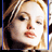 Static 48x48 pixel icon showing a close-up of a person's face with light brown hair, blue border frame, and visible pixelation artifacts.