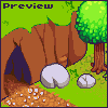 Pixel art scene showing a cave entrance with brown rock, green grass, and a tree on the right side. A small pile of white stones sits near the cave mouth.