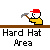 Pixel art of a character in yellow shirt and red cap holding hammer, with text "Hard Hat Area" below on gray background.