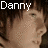 Pixelated image of a person's face with the name 'Danny' in white block letters at top left, dark background.