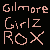 Pixelated text in light pink on black background reads 'Gilmore Girlz Rox' with distinct letterforms and spacing.