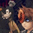 Pixelated static image shows a figure with light skin and brown hair holding a white dove against dark background, wearing beige clothing.