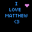 Pixelated blue text reads "I LOVE MATTHEW <3" on black background with pink heart or starburst symbols in four variations.