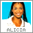 Pixelated portrait of a smiling person with long dark hair against a blue background, wearing a white top with brown accents, with the name 'ALICIA' in pixelated text below.