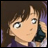 A 48x48 pixel buddy icon featuring a close-up of an anime-style character with brown hair and large eyes, holding a black phone to their ear against a dark background with white text reading "Anime IM" and "com".