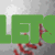 Green text 'LEGO RUSH' appears over a baseball with red stitching on a gray background.
