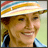 A woman wearing a striped sunhat and blue jacket smiles, with text reading "Georgia" and "Rule" appearing below her in