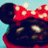 Pixelated close-up of a dark silhouette with large rounded ears, wearing a red bow with white polka dots against a light blue background.