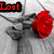 Two side-by-side animated frames show a grayscale figure with red text above, the left reading 'Lost' and the right 'Love', with a red rose held in the figure's hand.