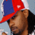 A pixelated image shows a person wearing a red and blue cap with white trim, next to yellow background text reading 'Murphy Lee' in purple letters.