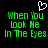 Green pixelated text reads "When You Look Me In The Eyes" with a white heart symbol above, displayed on black background.